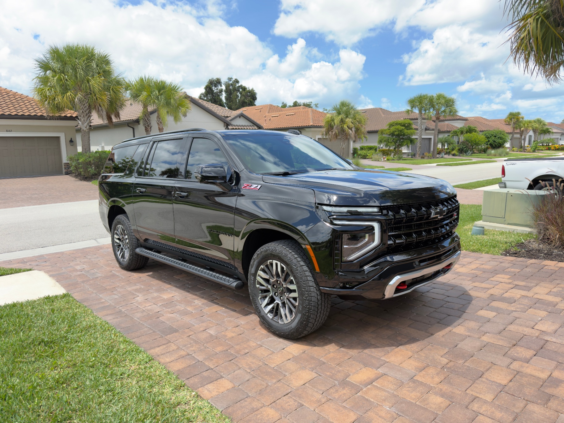 Side profile of black Chevrolet Suburban Z71